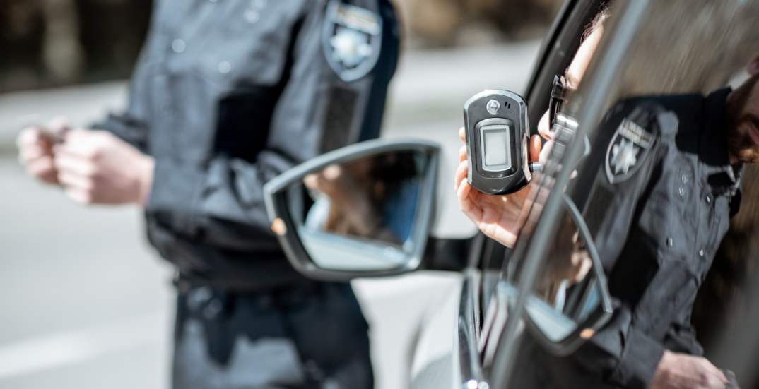 Driver calmly interacting with police officer